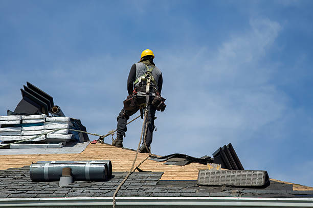 Professional Roofing technician working in Guasti, CA